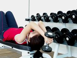 Woman exercising in gym Stock Footage