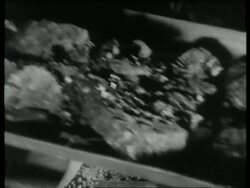 Men mining coal with pick axes underground, UK  1939 Stock Footage