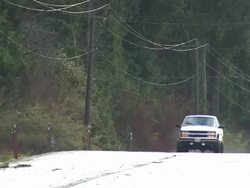 Pick-up Truck Driving Down Road News Clip