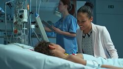 African-American mother visiting her son in intensive care Stock Footage