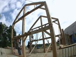 WS Carpenters at working while framing an energy efficient post / Grass Lake, Michigan, USA  Stock Footage