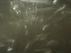 MC CU TU Bubbling hot spring water in underwater with rises to half water with sky and land / Lake Bogoria, Kenya Stock Footage