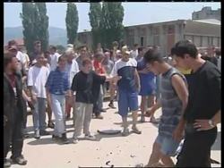 KOSOVO: MITROVICA: ETHNIC ALBANIANS MARCH INTO SERB AREA News Clip
