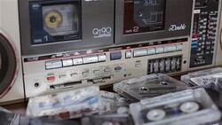 Old cassette tape recorder with cassettes. Stock Footage