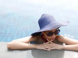 Woman in pool Stock Footage