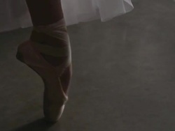 Close up of ballerina's point shoes performing assemblÃƒÂ©s and deboulÃƒÂ© Stock Footage