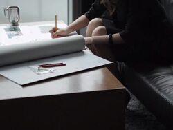 TU MS Young business woman writing, sitting at coffee table by window/ Beijing, China Stock Footage