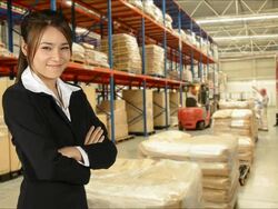 Business Woman And Worker Checking Inventory With Forklift Truck Stock Footage