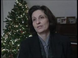 WEST BANK: BETHLEHEM: ARAFAT'S WIFE SOHA LIGHTS CHRISTMAS TREE News Clip