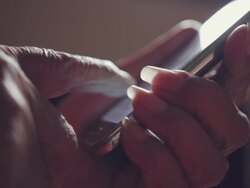 beautiful female elder hands using smartphone close up Stock Footage