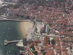 AERIAL WS TD Cityscape with beach and marina / Cascais, Lisbon, Portugal Stock Footage