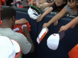 Von Miller and Peyton Manning autograph session Stock Footage