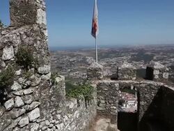 Sintra, Castle of the Moors (Castelo dos Mouros), view of the inner walls, and the Royal Palace in city Sintra  Stock Footage