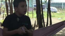 CLEAN : Refugees pause on closed Balkan route News Clip