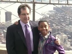 Tyrel Jackson Williams and Gary Marsh at The Disney Channel And Disney XD Stars Visit The Empire State Building on 3/12/2012 Stock Footage