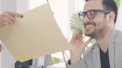 Business colleagues reviewing blueprints Stock Footage