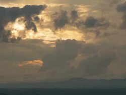 Time lapse of clouds move at sunset Stock Footage