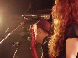 MS Shot of guitarist playing and singing on stage / Shimokitazawa, Tokyo, Japan Stock Footage