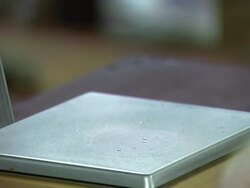 Glass jar on scale Stock Footage