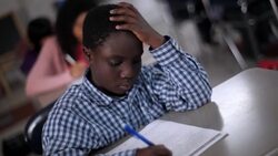 Male student taking test Stock Footage