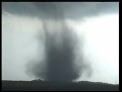 MS zoom out to WA, From inside car, Dust cloud swirling on horizon, forming in to tornado, Windscreen wipers, USA Stock Footage