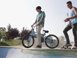 Teenage boys at skateboard park Stock Footage