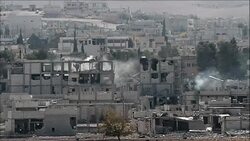 CLEAN : Smoke billows over Kobane as battles continue News Clip