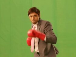 Portrait of a businessman wearing boxing gloves  Stock Footage
