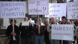 Residents of town with low birth rate and high death rate symbolically lay their town to rest News Clip