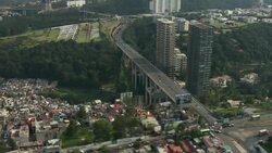 Above view of a six lane highway bridge crossing a valley in Mexico City. Stock Footage