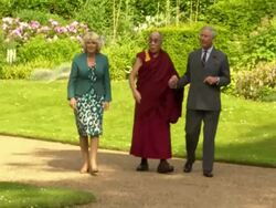 The Dalai Lama walks with Charles & Camilla News Clip