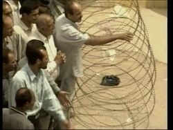 GWT: WRAP Iraqis rally against looting and disorder News Clip