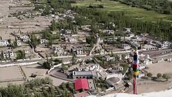 View of the Thiksay village from the Thiksay Monastery in Ladakh, Jammu and Kashmir, India Stock Footage