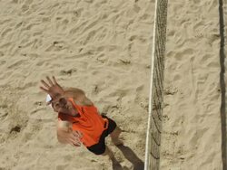 HD Super Slow-Mo: Beach Volleyball Player Serving Stock Footage