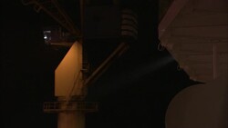 A beam of light shines across a foggy loading dock. Stock Footage