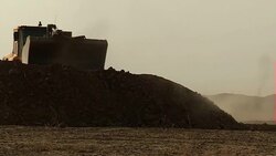 Peshmerga bulldozer constructing defences News Clip
