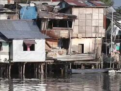 HD shacks along Pasig River Philippines Stock Footage