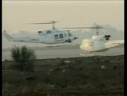 VOICE: Inspectors depart in helicopters, plus women in military parade News Clip