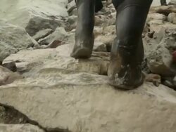 MS POV Miner climbing the Ijen volcano crater carrying sulfur / Ijen, Java, Indonesia Stock Footage