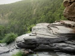 WS PAN View of Katterskill Creek at top of Katterskill falls at misty / Haines Falls, New York, United States Stock Footage