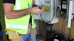 Electrician / Handyman Wiring a Fuse Box Close up Stock Footage