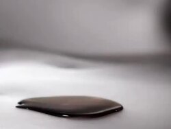 Waffle Rolling through syrup Stock Footage