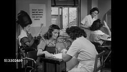 1945: BEAUTY CARE: HD: EXT Shipyard Beauty Shop, INT women having hair &amp; nails done. Woman getting manicure. Woman under hairdryer. Hairdresser brushing woman's hair. EXT WS Saks and Company store w/ car passing on 49th Street FG. Instructional Video