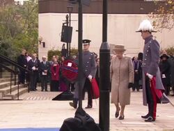 Queen lays poppy wreath at Memorial Garden News Clip