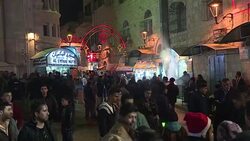 CLEAN : Bethlehem Chirstian pilgrims watch traditional midnight mass News Clip