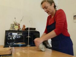 MS Shot of female potter kneads clay at pottery / Landshut, Bavaria, Germany Stock Footage