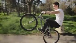 driving bike on second wheel,extreme sport Stock Footage