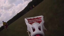 'A lacrosse stick catches, cradles, and then tosses a lacrosse ball.' Stock Footage