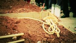 HD: People Throwing Dirt Into the Grave Stock Footage