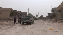 VOICED : Fuerzas iraquies combaten a Estado Islamico en Faluya y Mosul News Clip